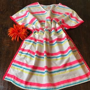 White multi-color swim wear poncho.